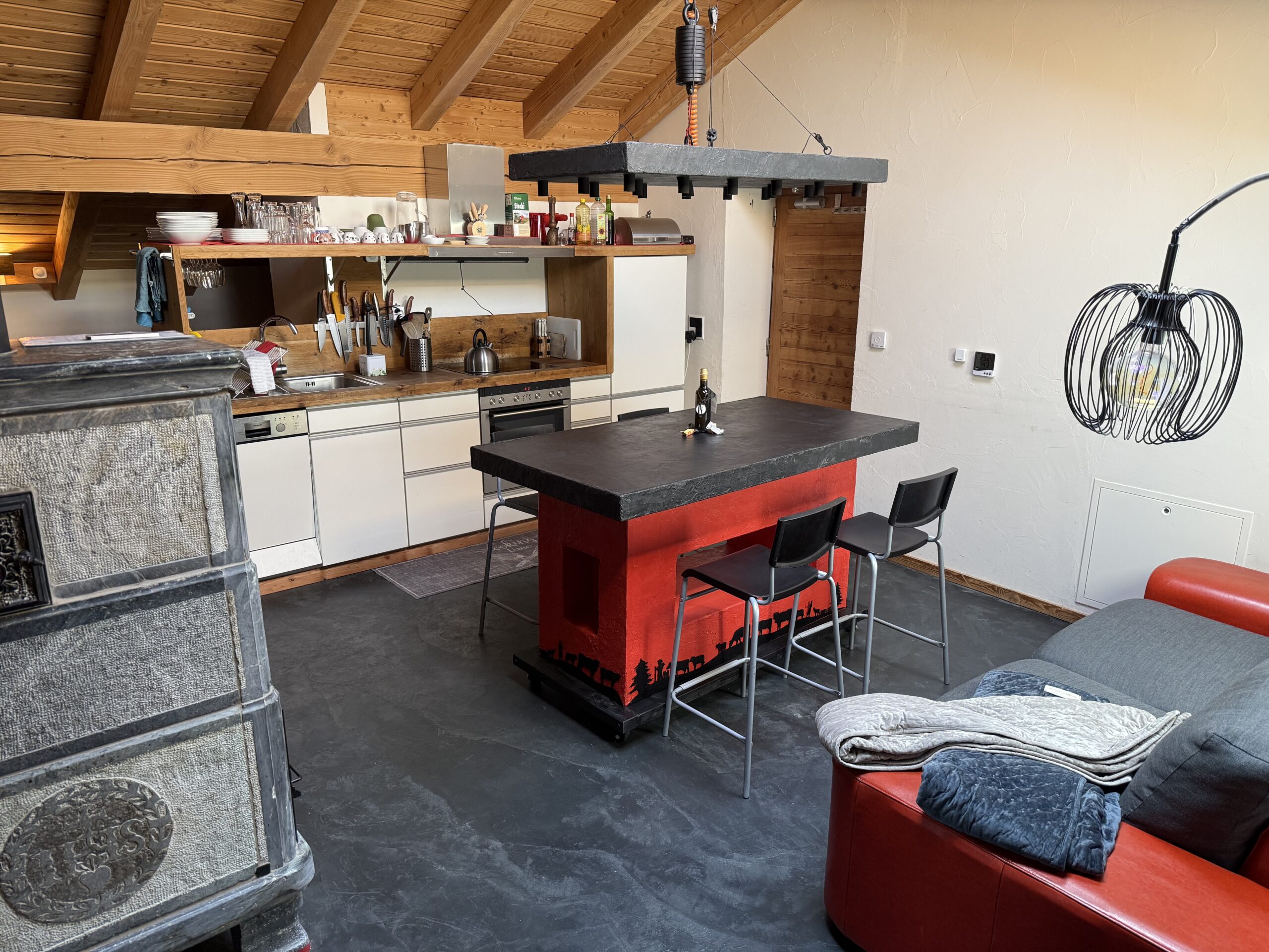 Dining table in Under the Roof apartment, Arbaz