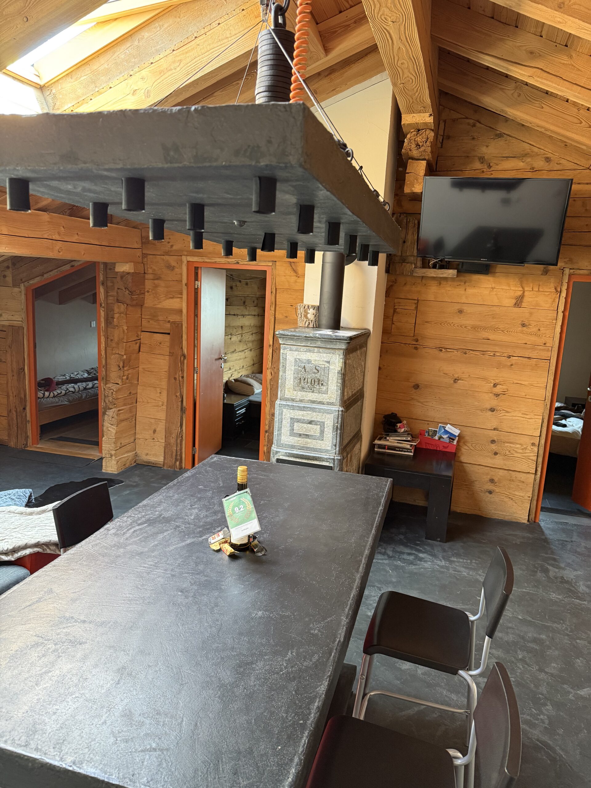 Fireplace in the dining room of Under the Roof apartment, Arbaz