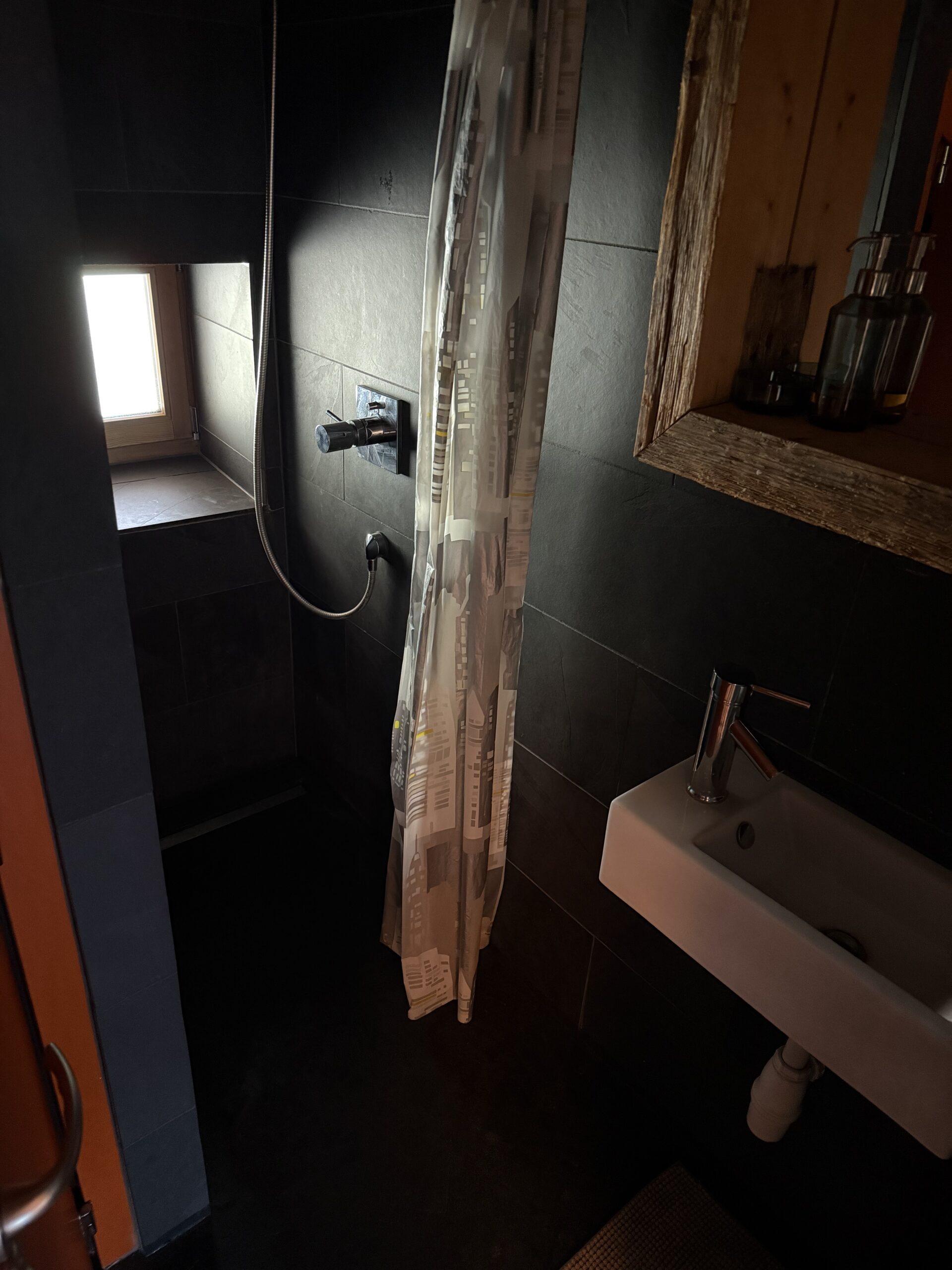 East-side shower in Under the Roof apartment, Arbaz