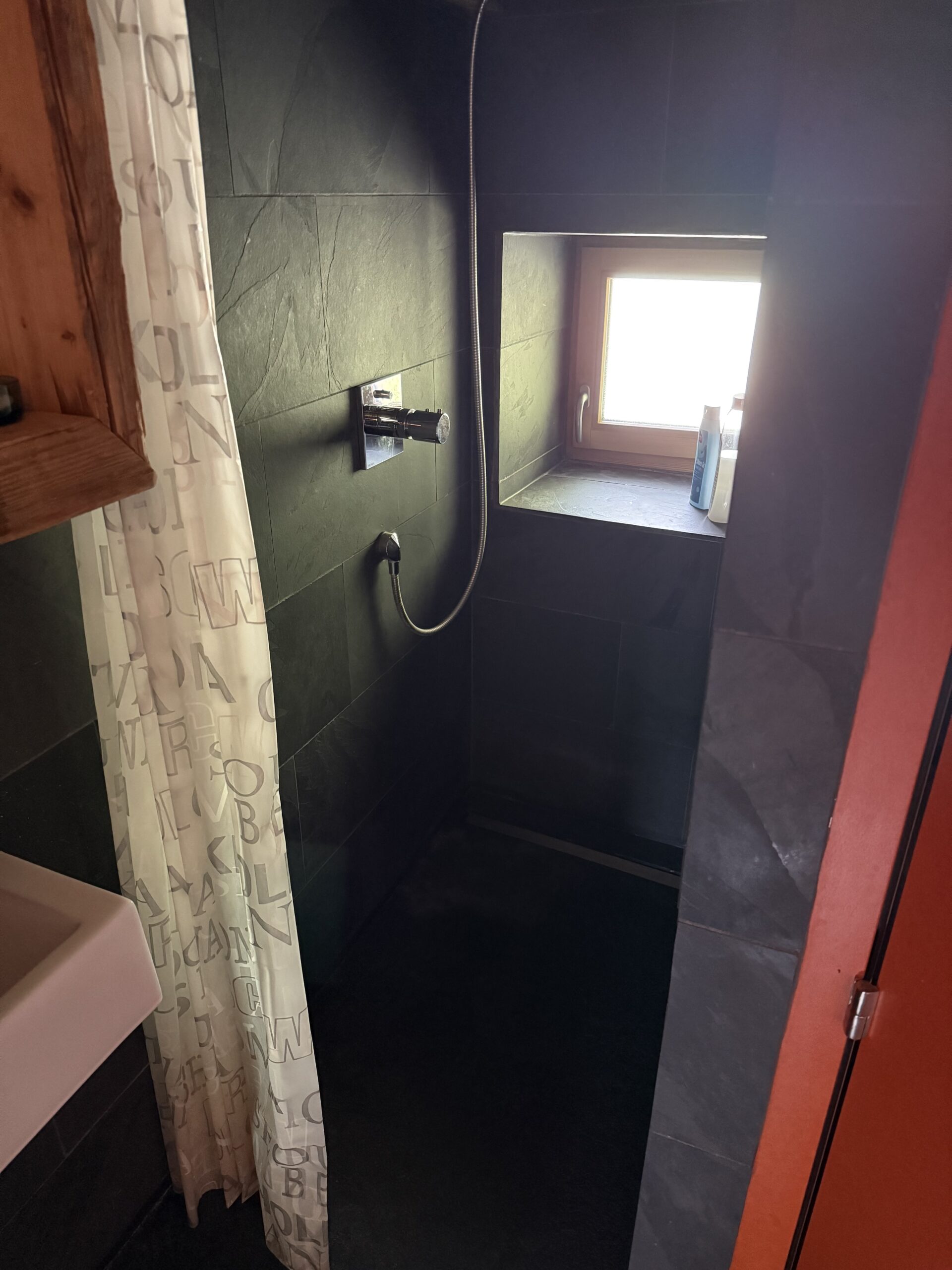West-side shower in Under the Roof apartment, Arbaz