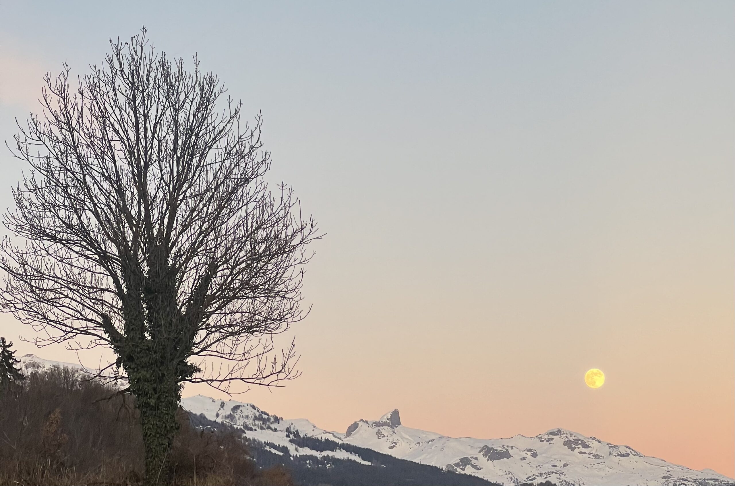 Moonrise over the mountains in Arbaz, Valais